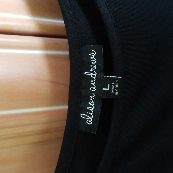 Brand new without tags such a comfortable fabric. Cold shoulder and cut on bias. - Picture 2 of 2